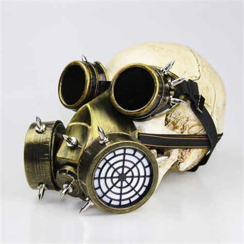Montaje de varios accesorios steampunk: máscara de gas, reloj de bolsillo, gafas y un sombrero de copa