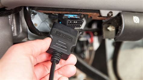 Símbolo del conector OBD en un coche