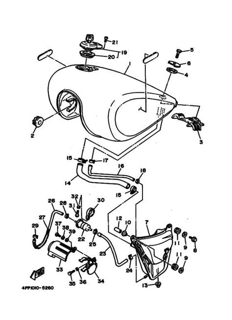 Diagram showing the location of the air filter within the chrome teardrop housing on a Yamaha Virago 1100