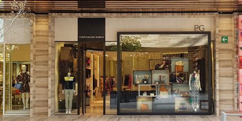 Fachada de una tienda Purificación García en una calle comercial